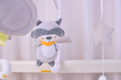 Karuzela z pozytywką do łóżeczka Sun Baby szop Karuzela z pozytywką do łóżeczka Sun Baby szop
