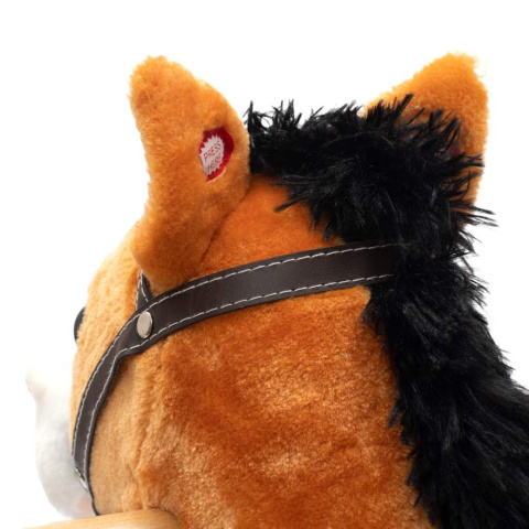 Konik na biegunach z melodią i apaszką Baby Mix Blesk 46441 18m+ Konik na biegunach z melodią i apaszką Baby Mix Blesk 46441 18m+